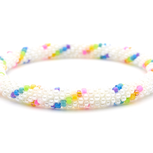 Sashka Co handmade beaded friendship bracelet with white and rainbow spiral glass beads. Crafted in Nepal by skilled artisans.