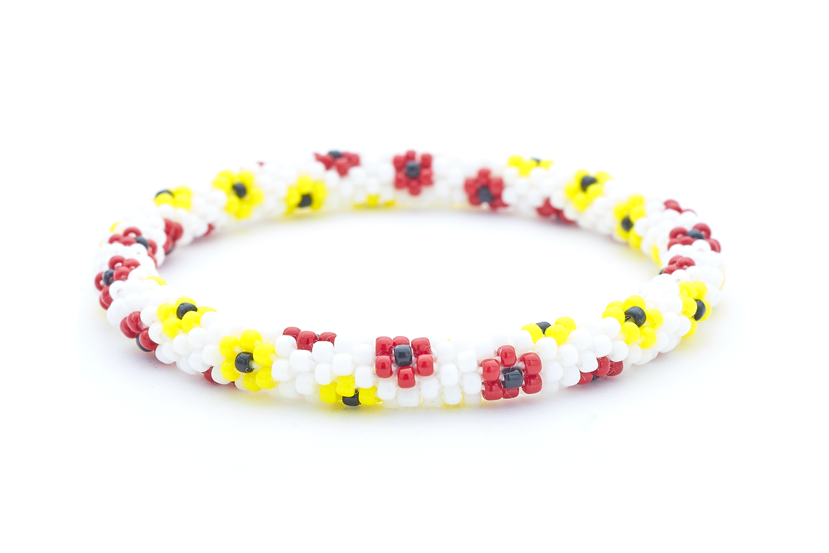 Sashka Co. handmade beaded friendship bracelet with white, red, yellow, and black glass beads in a flower pattern. Crafted in Nepal by skilled artisans.
