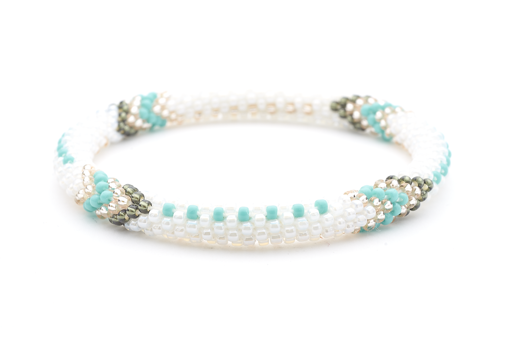 Sashka Co handmade beaded friendship bracelet with white, turquoise, silver, and rose gold glass beads. Crafted in Nepal by skilled artisans.