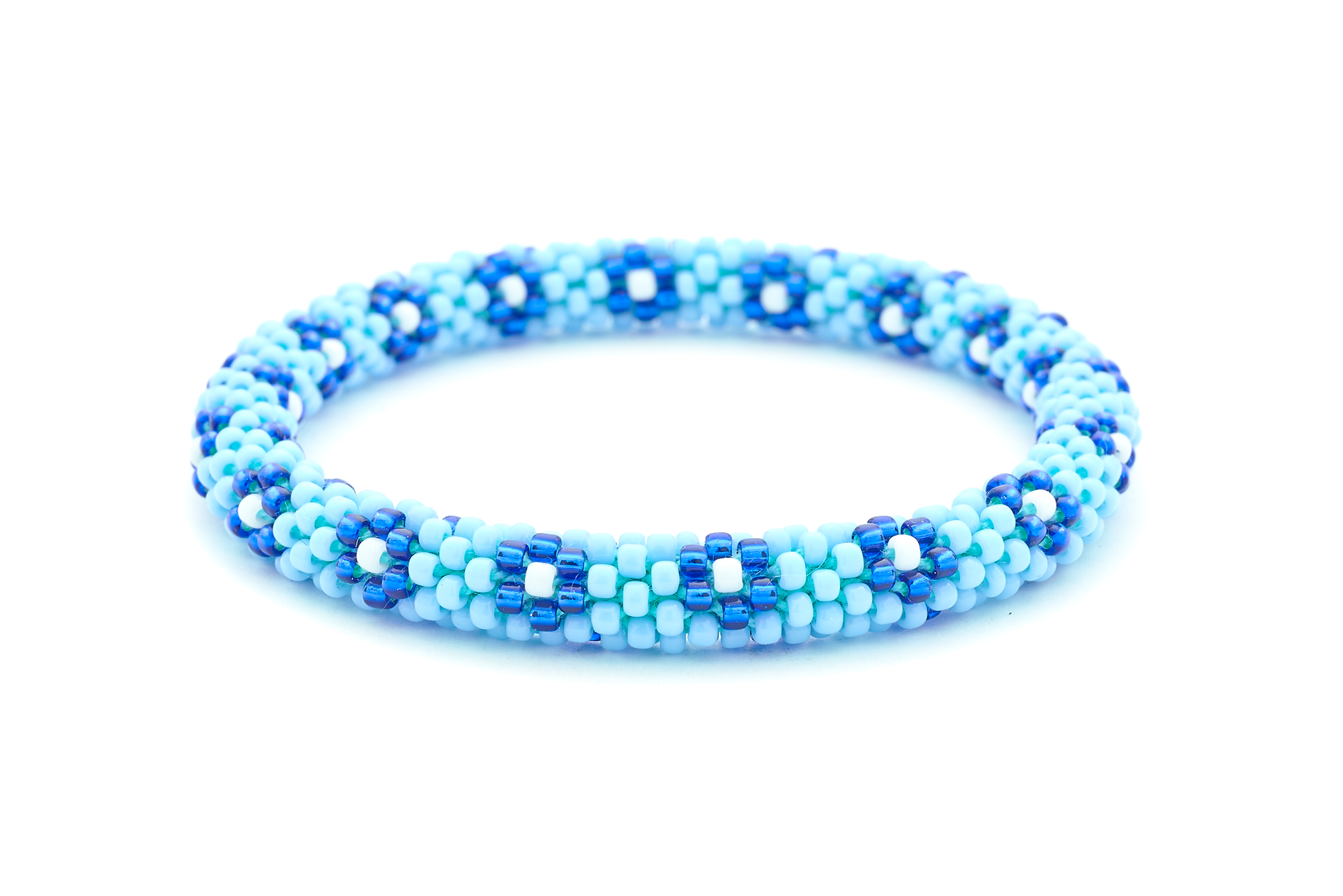 Sashka Co handmade beaded friendship bracelet with baby blue, blue, and white glass beads. Crafted in Nepal by skilled artisans in a flower pattern.