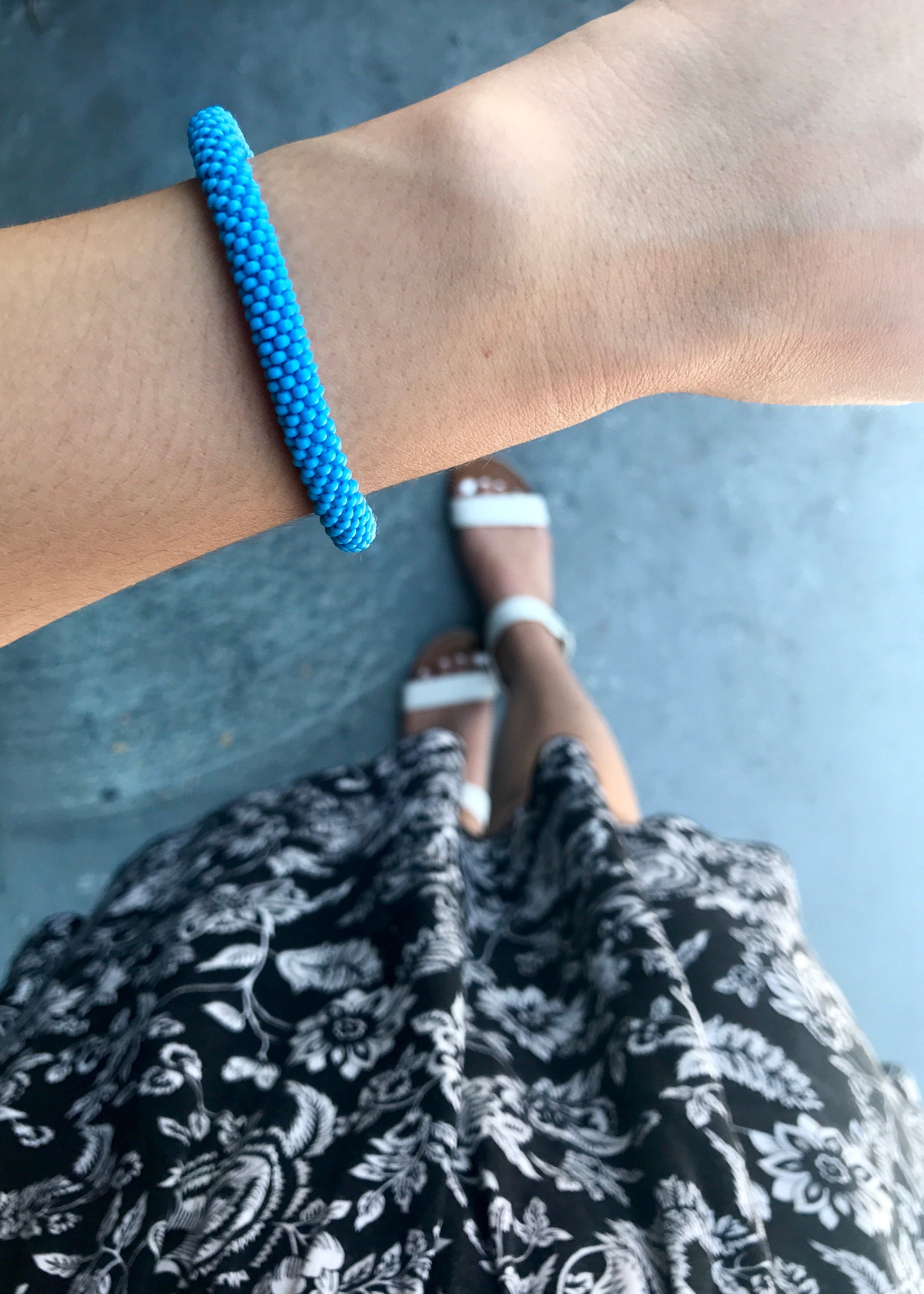 Sashka Co handmade beaded friendship bracelet with solid baby blue glass beads. Fair trade and artisan-made in Nepal.
 