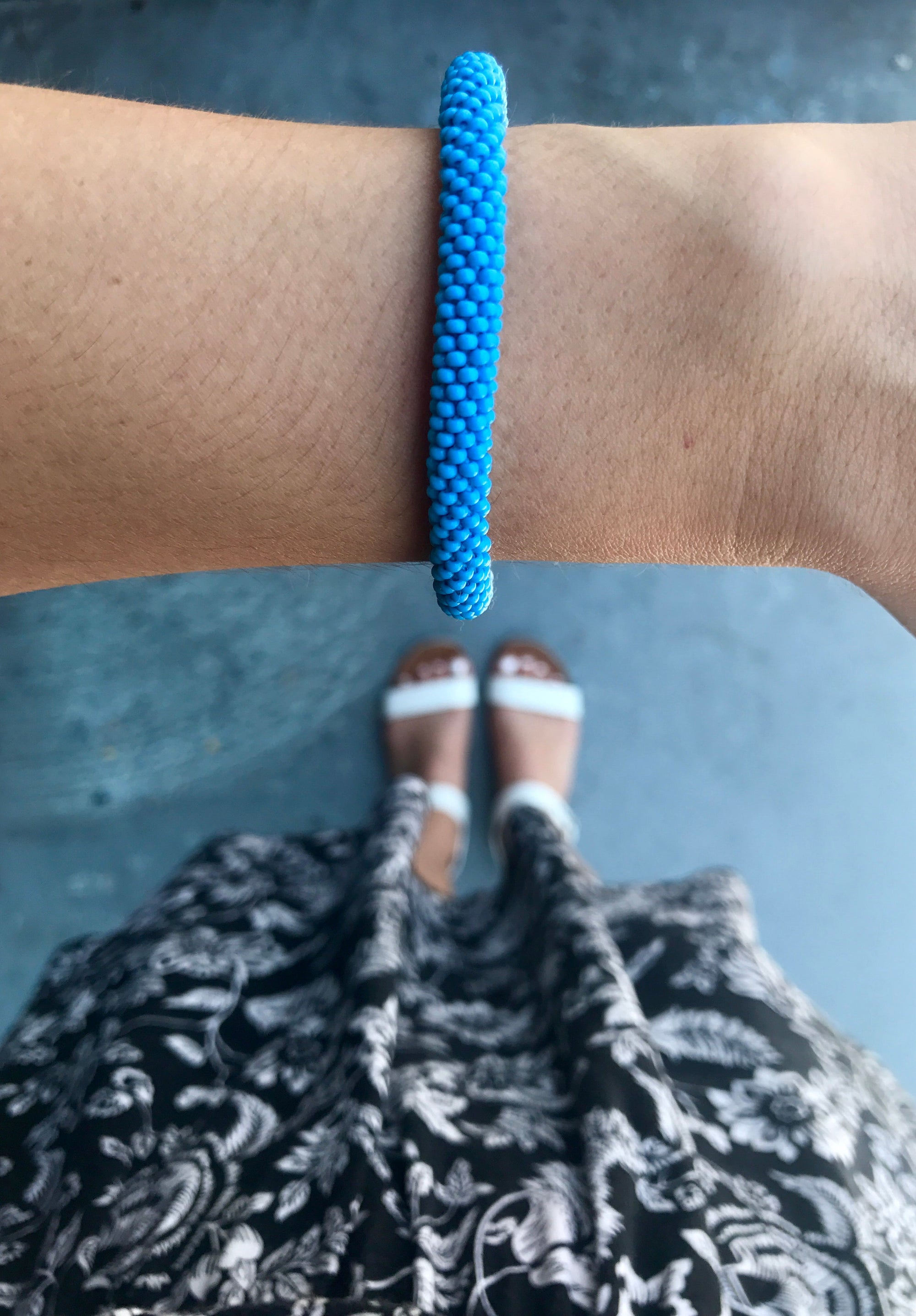 Sashka Co handmade beaded friendship bracelet with solid baby blue glass beads. Fair trade and artisan-made in Nepal.