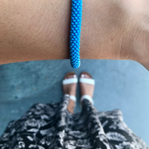 Sashka Co handmade beaded friendship bracelet with solid baby blue glass beads. Fair trade and artisan-made in Nepal.