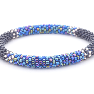 Sashka Co handmade beaded friendship bracelet with black, clear, and iridescent blue glass beads. Crafted in Nepal by skilled artisans.