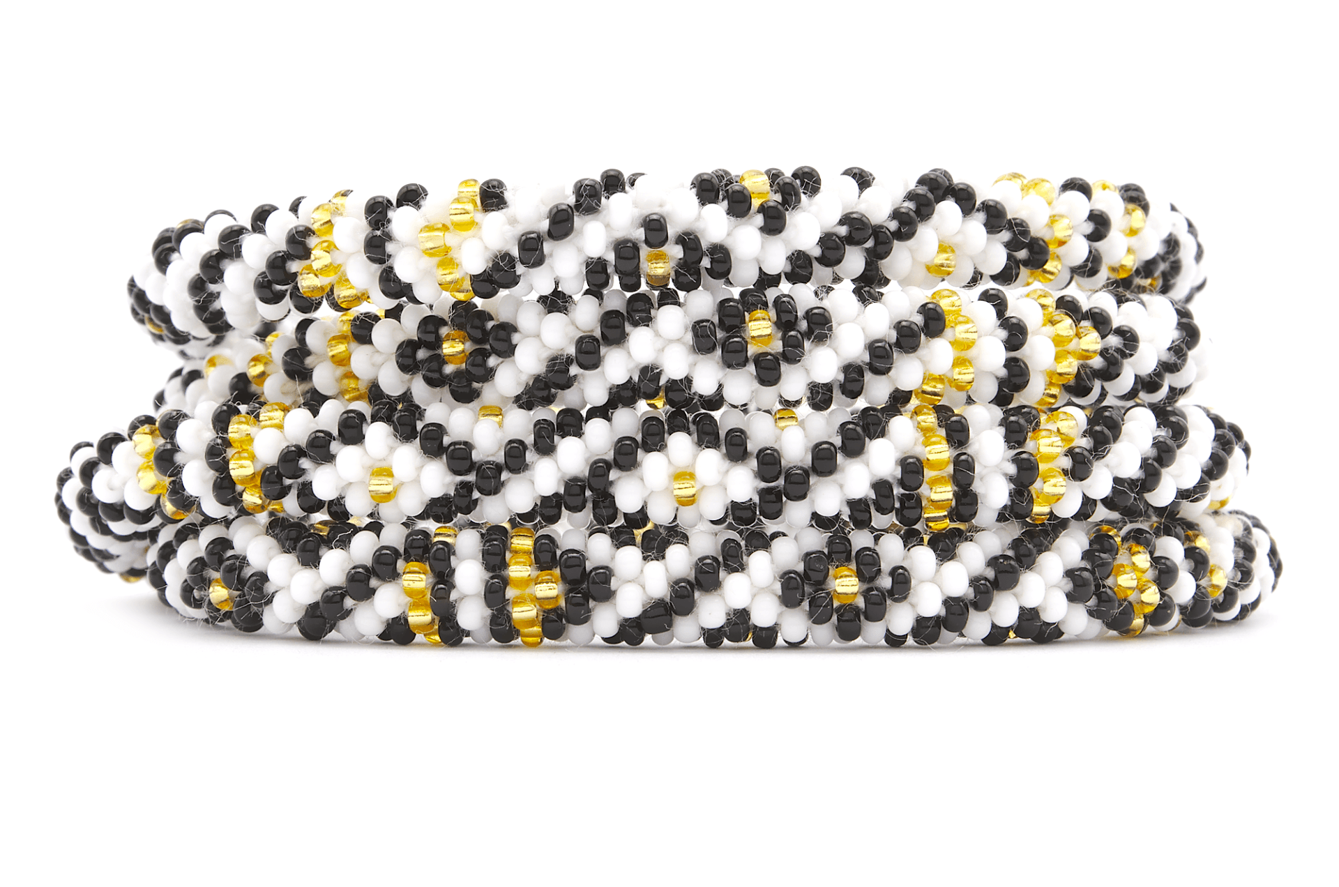 Sashka Co handmade beaded friendship bracelet with black, white, and gold glass beads. Crafted in Nepal by skilled artisans in a diamond pattern.