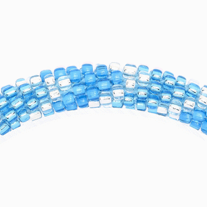 Sashka Co handmade beaded friendship bracelet with blue and clear beads in a chevron pattern. Crafted in Nepal by skilled artisans.