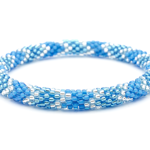 Sashka Co handmade beaded friendship bracelet with blue and clear beads in a chevron pattern. Crafted in Nepal by skilled artisans.