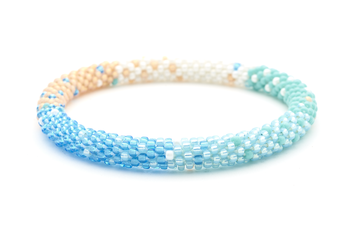 Sashka Co handmade beaded friendship bracelet with blue, coral, turquoise, and white block mix pattern. Crafted in Nepal by skilled artisans.
