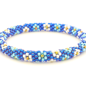Sashka Co handmade beaded friendship bracelet with blue, light blue, white, and iridescent glass beads. Crafted in Nepal by skilled artisans.