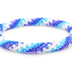 Sashka Co handmade beaded friendship bracelet with blue, light blue, and white glass beads. Crafted in Nepal by skilled artisans.