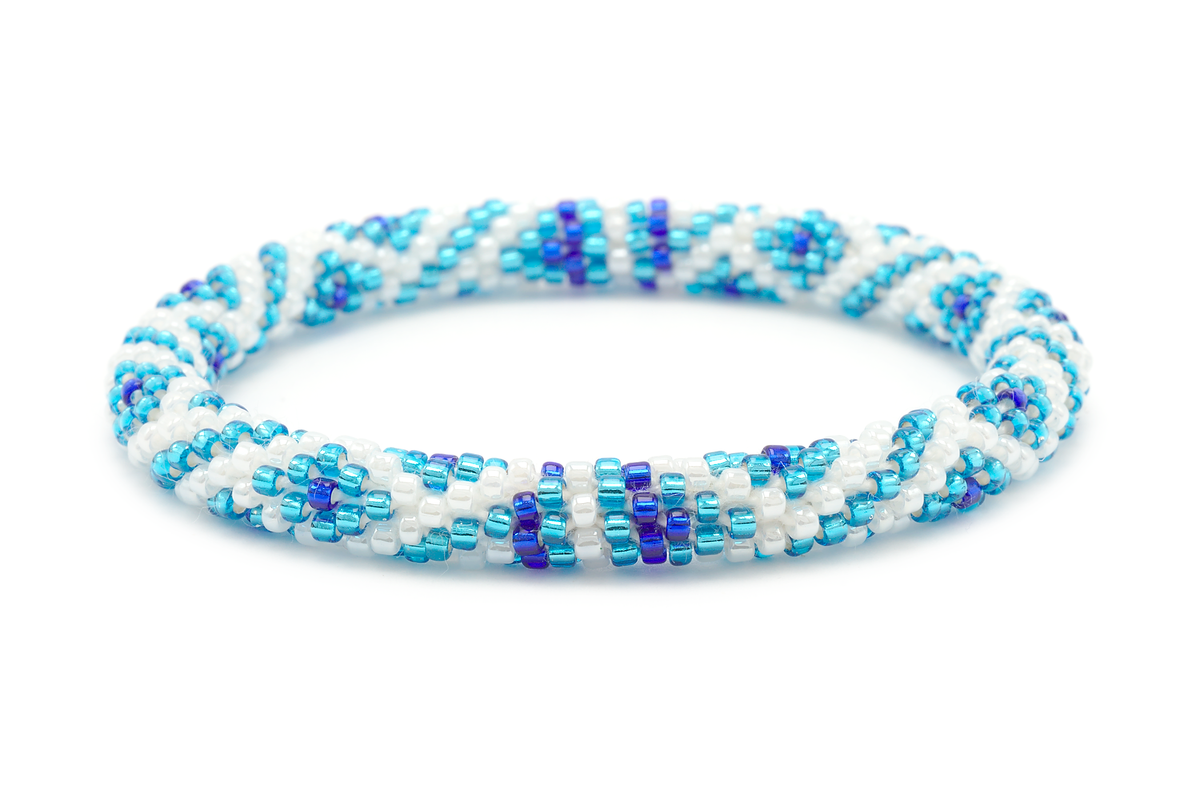Sashka Co handmade beaded friendship bracelet with blue and white glass beads. Crafted in Nepal by skilled artisans in a diamond spiral pattern.