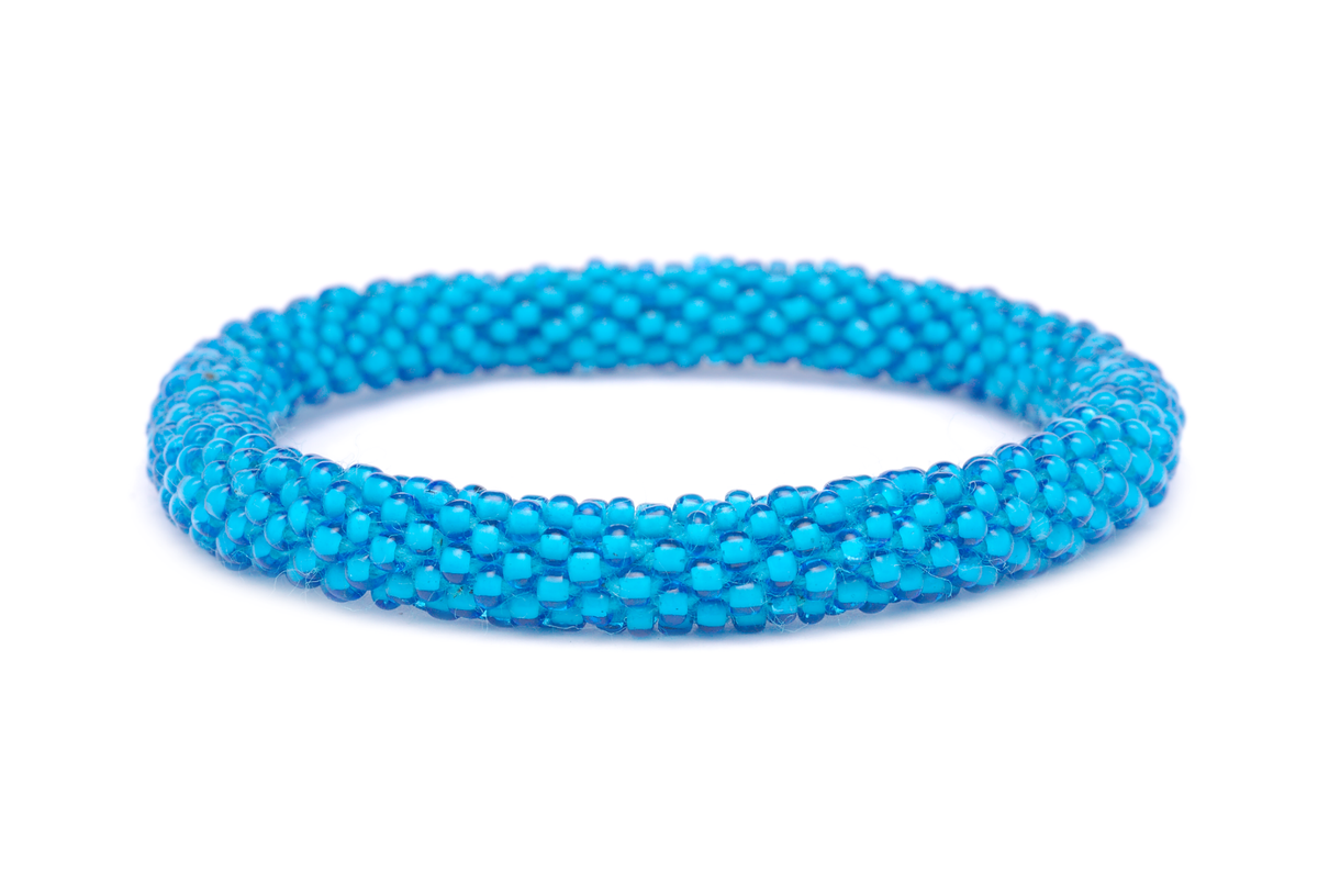 Sashka Co handmade beaded friendship bracelet with blue glass beads. Crafted in Nepal by skilled artisans in a solid pattern.