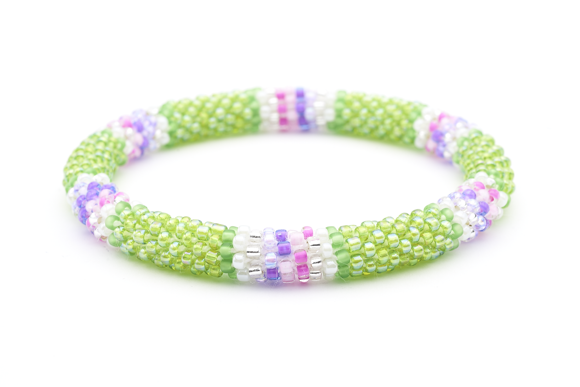 Sashka Co handmade beaded friendship bracelet with green, pink, purple, clear, and white glass beads. Crafted in Nepal by skilled artisans.