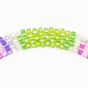 Sashka Co handmade beaded friendship bracelet with green, pink, purple, clear, and white glass beads. Crafted in Nepal by skilled artisans.