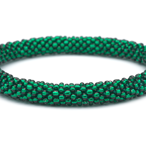 Sashka Co handmade beaded friendship bracelet with green glass beads. Crafted in Nepal by skilled artisans in a solid pattern.