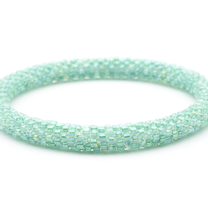 Sashka Co handmade beaded friendship bracelet with solid iridescent aqua glass beads. Crafted in Nepal by skilled artisans.