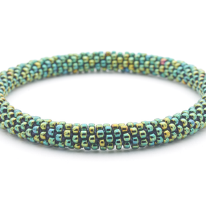 Sashka Co handmade beaded friendship bracelet with iridescent green solid design. Crafted in Nepal by skilled artisans.