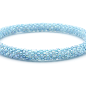 Sashka Co handmade beaded friendship bracelet with iridescent blue glass beads. Crafted in Nepal by skilled artisans in a solid pattern.