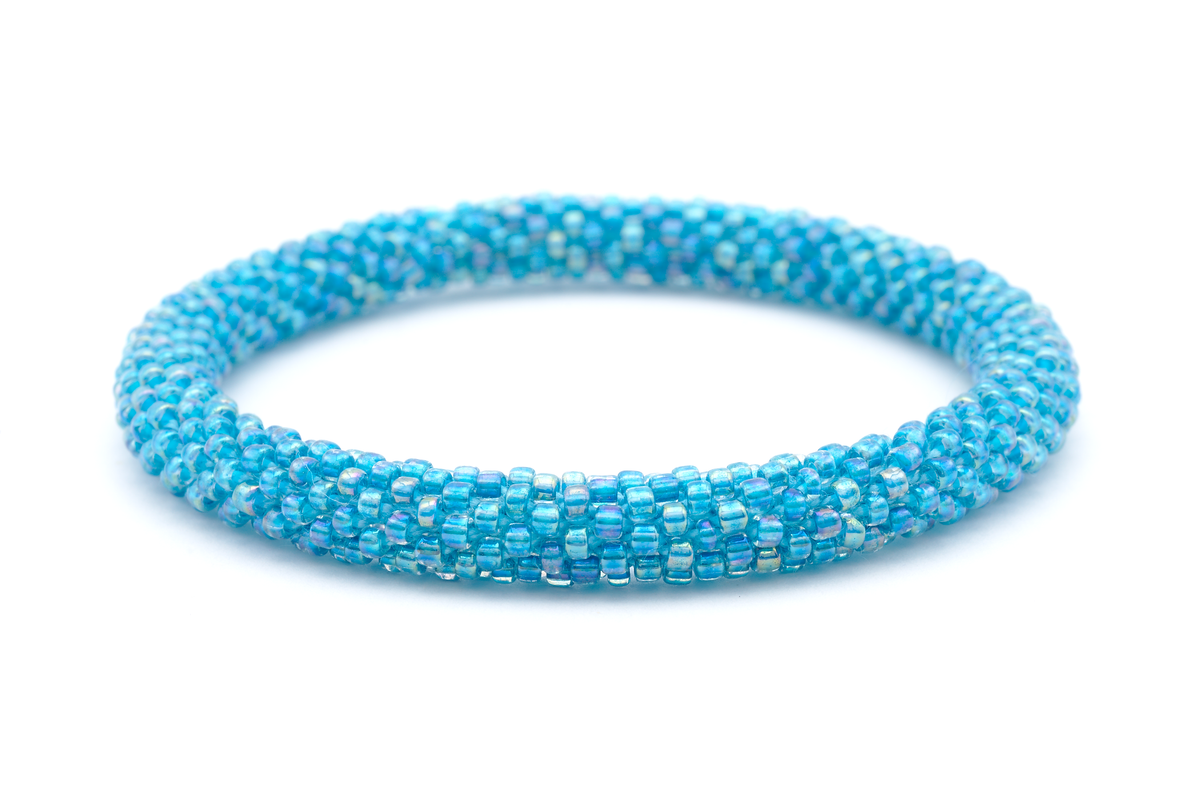 Sashka Co handmade beaded friendship bracelet with solid iridescent blue glass beads. Crafted in Nepal by skilled artisans.