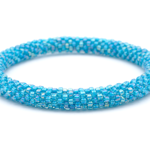 Sashka Co handmade beaded friendship bracelet with solid iridescent blue glass beads. Crafted in Nepal by skilled artisans.