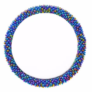 Sashka Co handmade beaded friendship bracelet with iridescent blue glass beads. Crafted in Nepal by skilled artisans in a solid pattern.