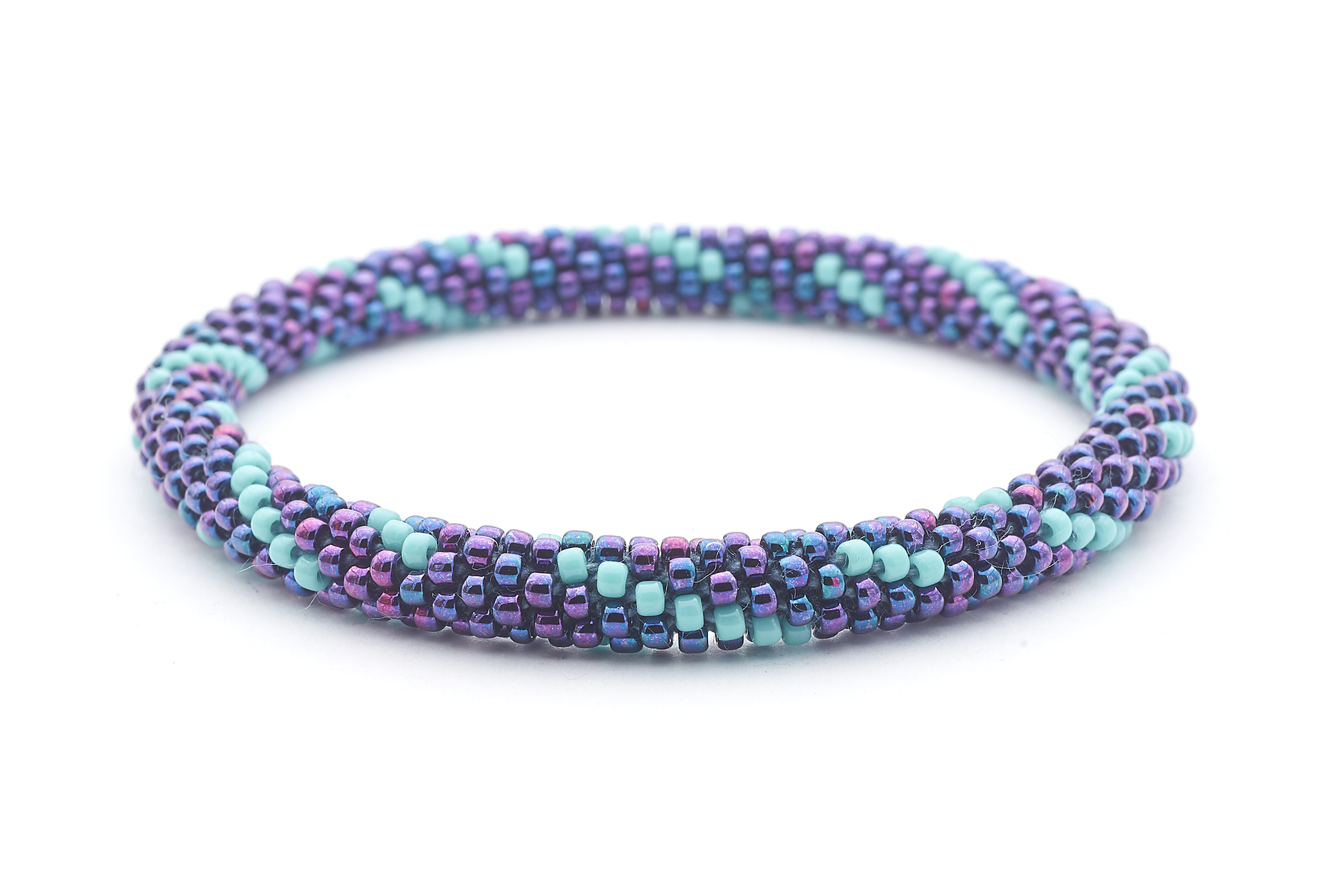 Sashka Co handmade beaded friendship bracelet with iridescent purple-blue and turquoise glass beads. Crafted in Nepal by skilled artisans in a spiral pattern.