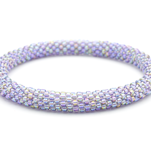 Sashka Co handmade beaded friendship bracelet with iridescent purple glass beads. Crafted in Nepal by skilled artisans in a solid pattern.