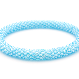 Sashka Co handmade beaded friendship bracelet with light blue glass beads. Crafted in Nepal by skilled artisans in a solid pattern.