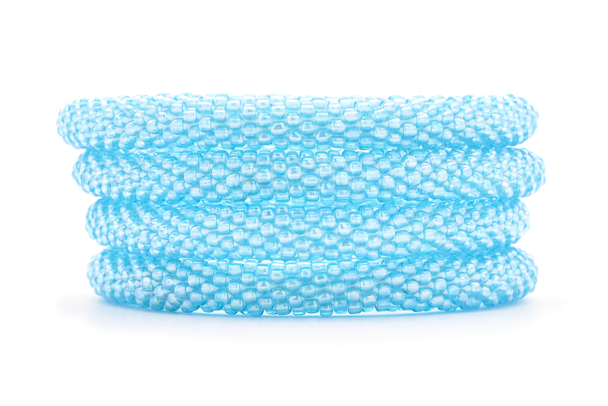 Sashka Co handmade beaded friendship bracelet with light blue glass beads. Crafted in Nepal by skilled artisans in a solid pattern.