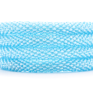 Sashka Co handmade beaded friendship bracelet with light blue glass beads. Crafted in Nepal by skilled artisans in a solid pattern.