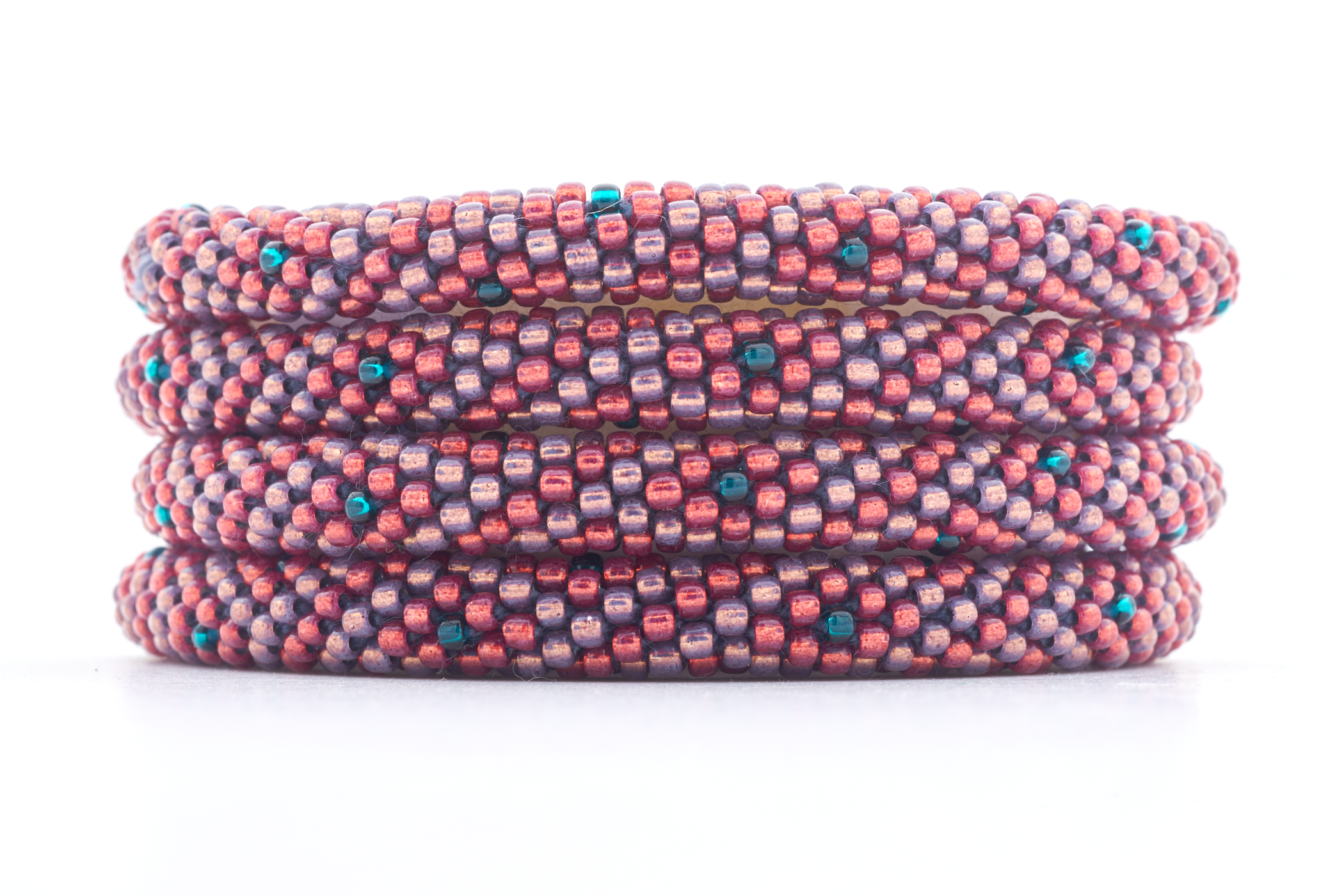 Sashka Co handmade beaded friendship bracelet with maroon, mauve, and teal glass beads. Crafted in Nepal by skilled artisans in a diamond spiral pattern.