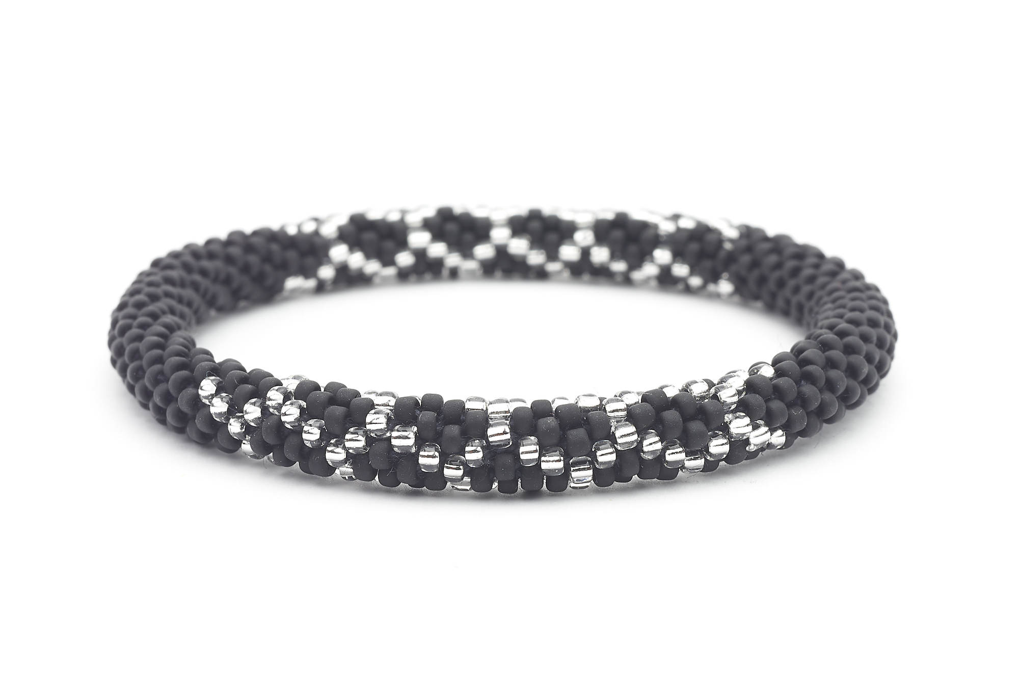 Sashka Co handmade beaded friendship bracelet with matte black and clear glass beads. Crafted in Nepal by skilled artisans in a lattice pattern.