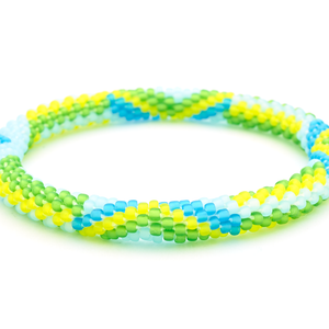 Sashka Co handmade beaded friendship bracelet with matte blue, light blue, green, and yellow glass beads. Crafted in Nepal by skilled artisans in a zipper zigzag pattern.

