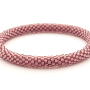 Sashka Co handmade beaded friendship bracelet with matte burgundy glass beads. Crafted in Nepal by skilled artisans in a solid pattern.