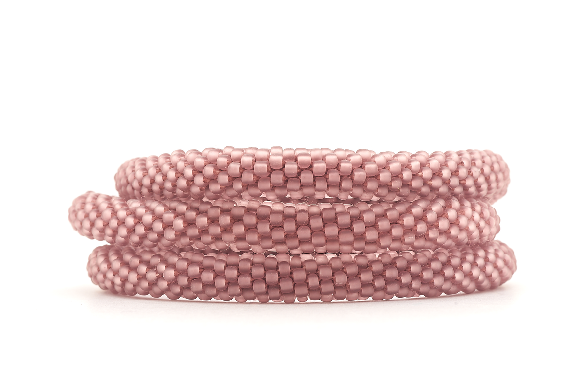 Sashka Co handmade beaded friendship bracelet with matte burgundy glass beads. Crafted in Nepal by skilled artisans in a solid pattern.