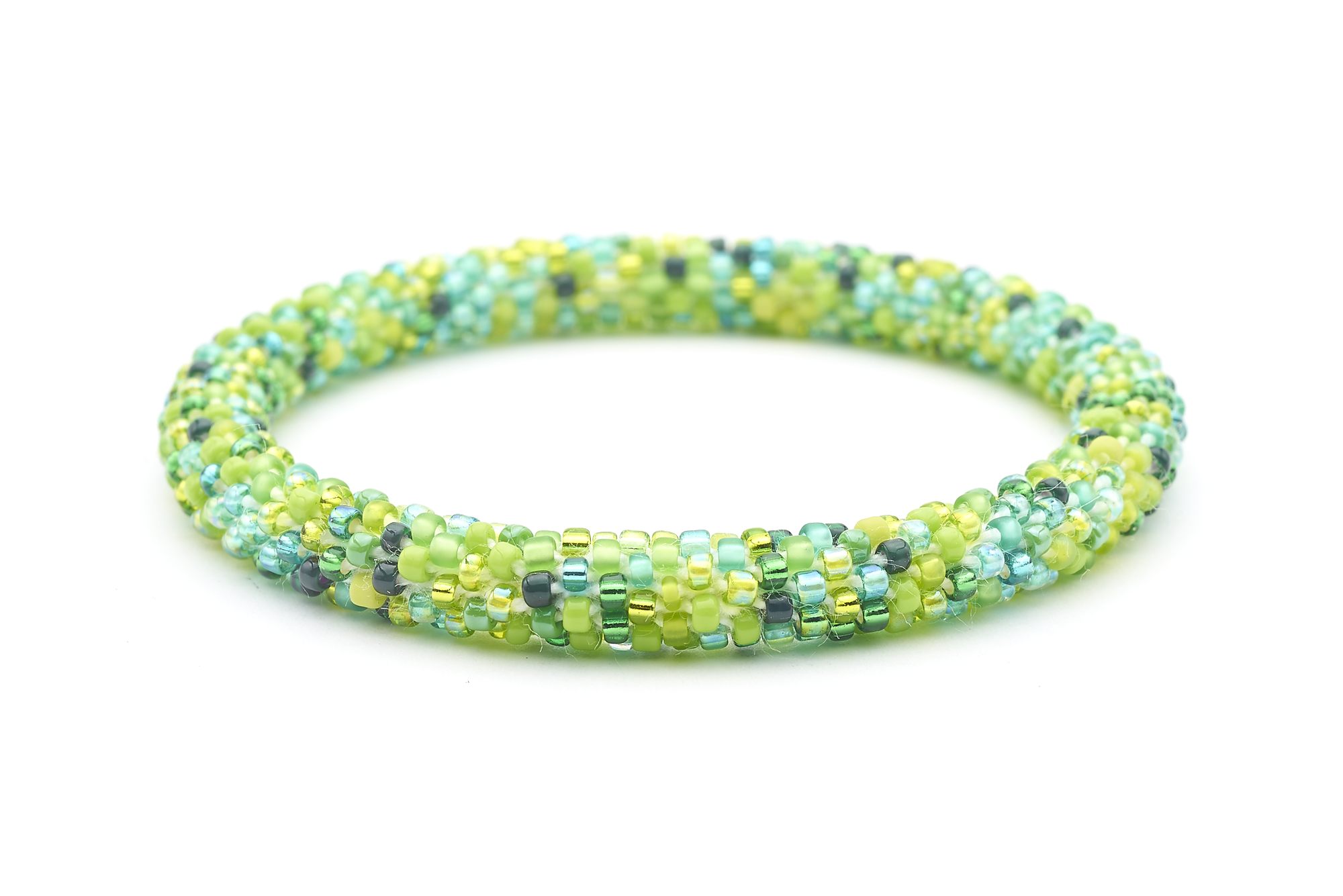 Sashka Co handmade beaded friendship bracelet with mixed shades of green glass beads. Crafted in Nepal by skilled artisans in a confetti pattern.