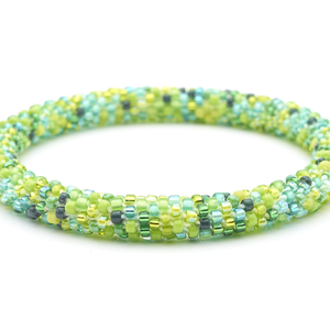 Sashka Co handmade beaded friendship bracelet with mixed shades of green glass beads. Crafted in Nepal by skilled artisans in a confetti pattern.