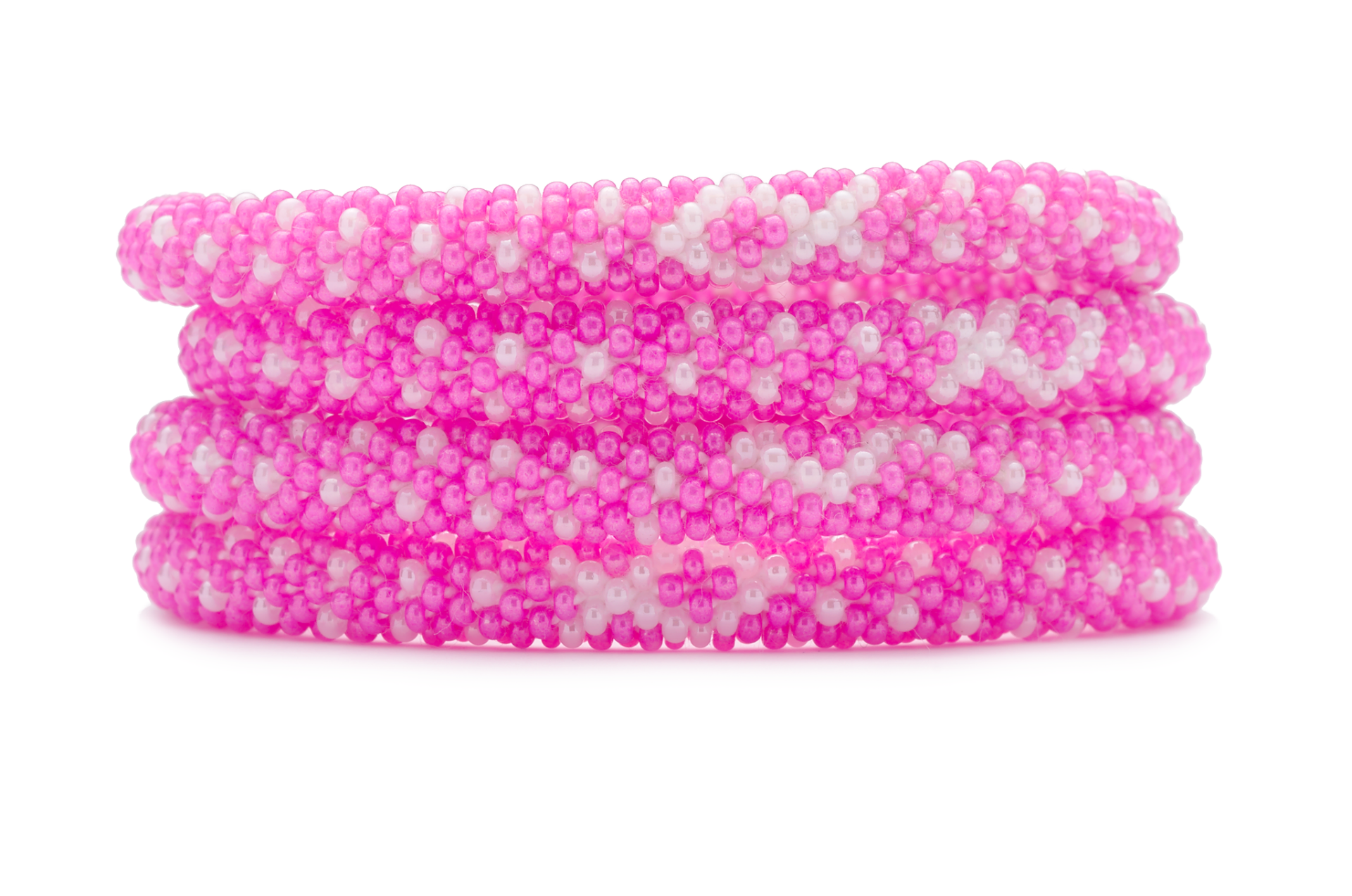 Sashka Co handmade beaded friendship bracelet with pink and white glass beads. Crafted in Nepal by skilled artisans in a detailed ribbon pattern.