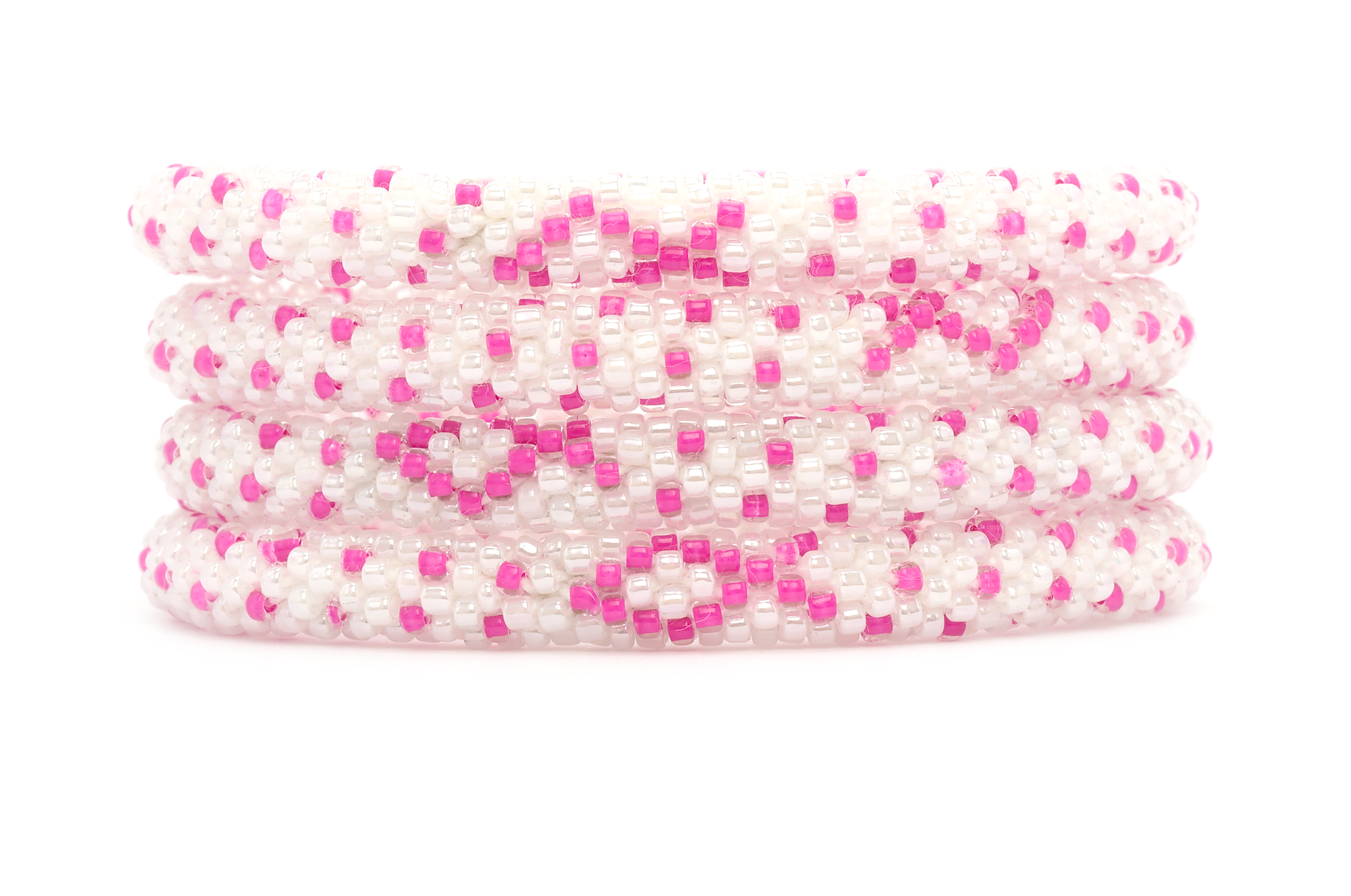 Sashka Co handmade beaded friendship bracelet with pink and white glass beads. Crafted in Nepal by skilled artisans in a detailed ribbon pattern.
