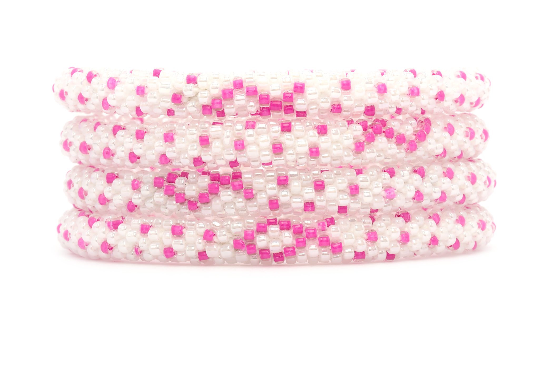 Sashka Co handmade beaded friendship bracelet with pink and white glass beads. Crafted in Nepal by skilled artisans in a detailed ribbon pattern.