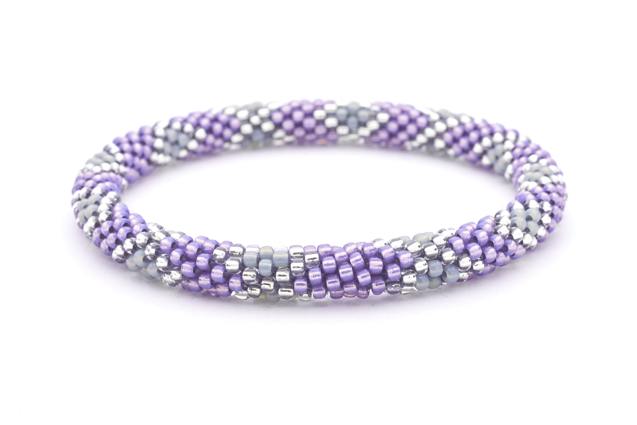 Sashka Co handmade friendship bracelet with purple, gray, and clear glass beads in a diamond pattern. Made in Nepal.