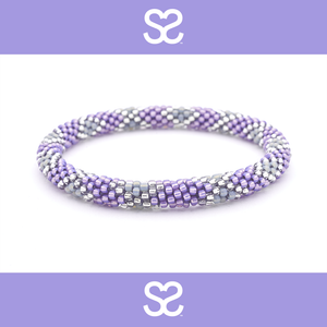 Sashka Co handmade friendship bracelet with purple, gray, and clear glass beads in a diamond pattern. Made in Nepal.
