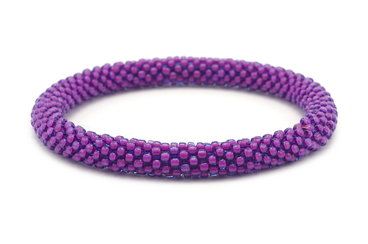 Sashka Co handmade beaded friendship bracelet with purple glass beads. Crafted in Nepal by skilled artisans in a solid pattern.