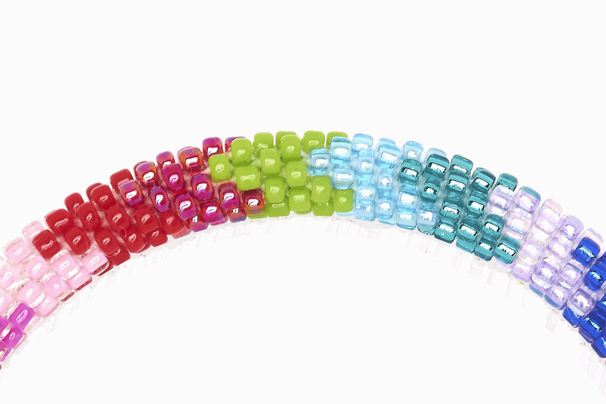 Sashka Co handmade beaded friendship bracelet with rainbow glass beads. Crafted in Nepal by skilled artisans in a detailed chevron pattern.