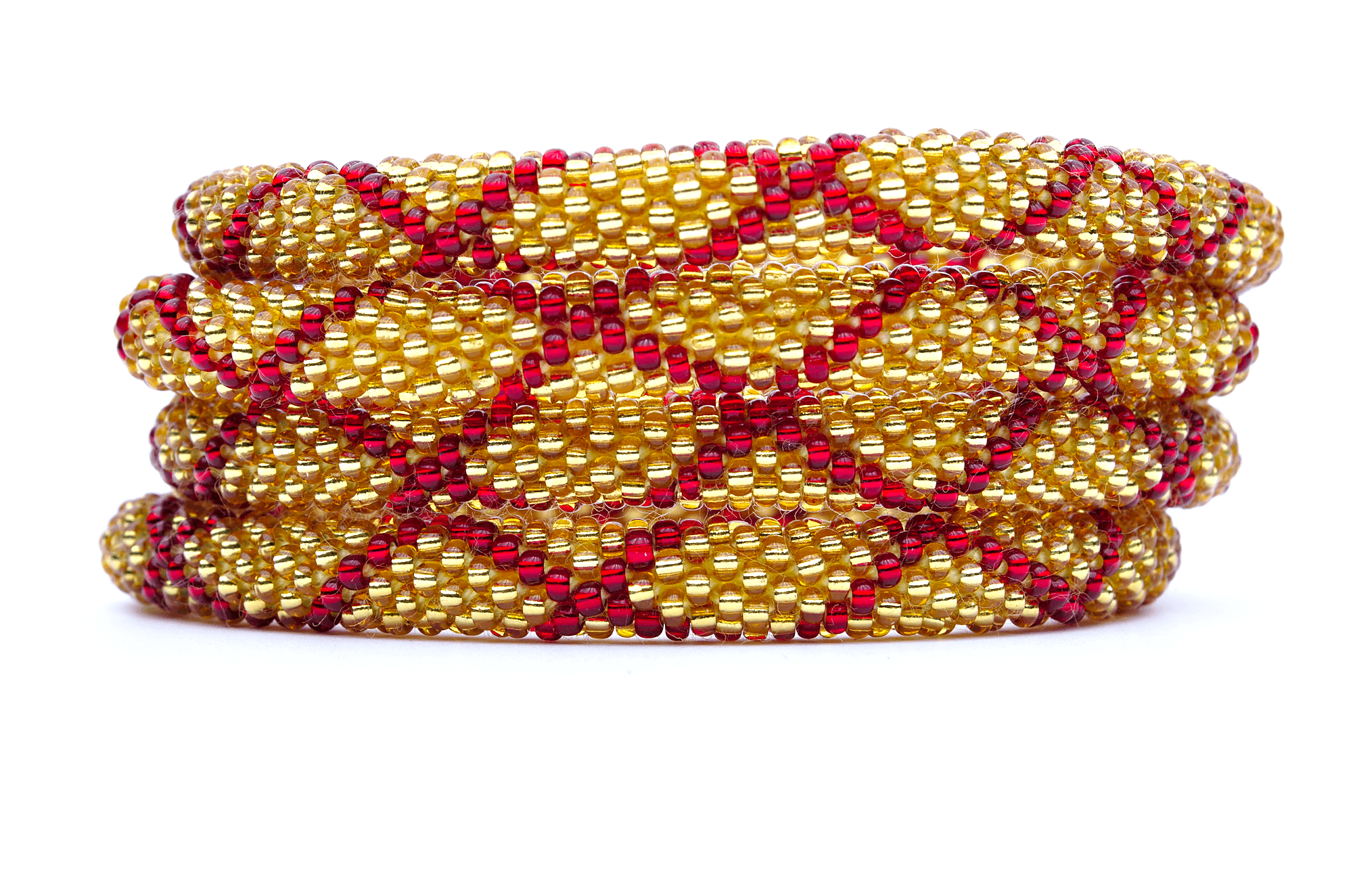 Sashka Co handmade beaded friendship bracelet with red and gold glass beads. Crafted in Nepal by skilled artisans in a criss cross pattern.