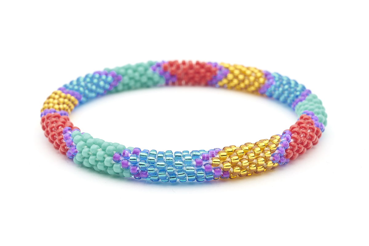 Sashka Co handmade beaded friendship bracelet with red, turquoise, blue, purple, and gold glass beads. Crafted in Nepal by skilled artisans.