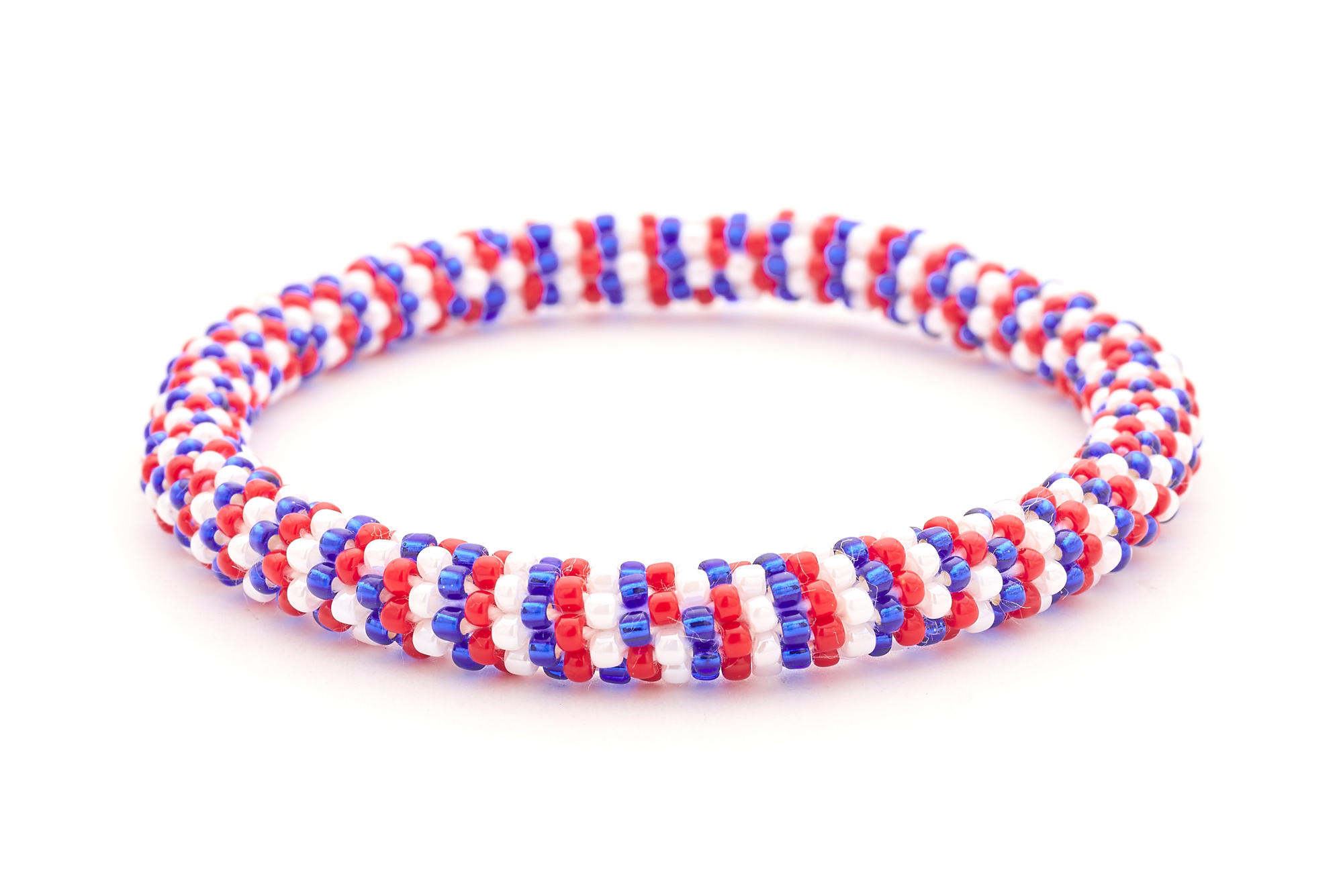 Sashka Co handmade beaded friendship bracelet with red, white, and blue line pattern. Crafted in Nepal by skilled artisans.