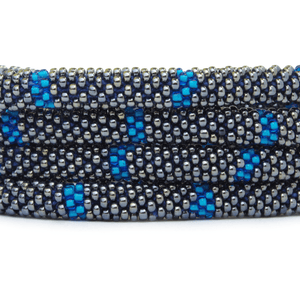 Sashka Co handmade beaded friendship bracelet with silver and blue glass beads. Crafted in Nepal by skilled artisans in a line pattern.