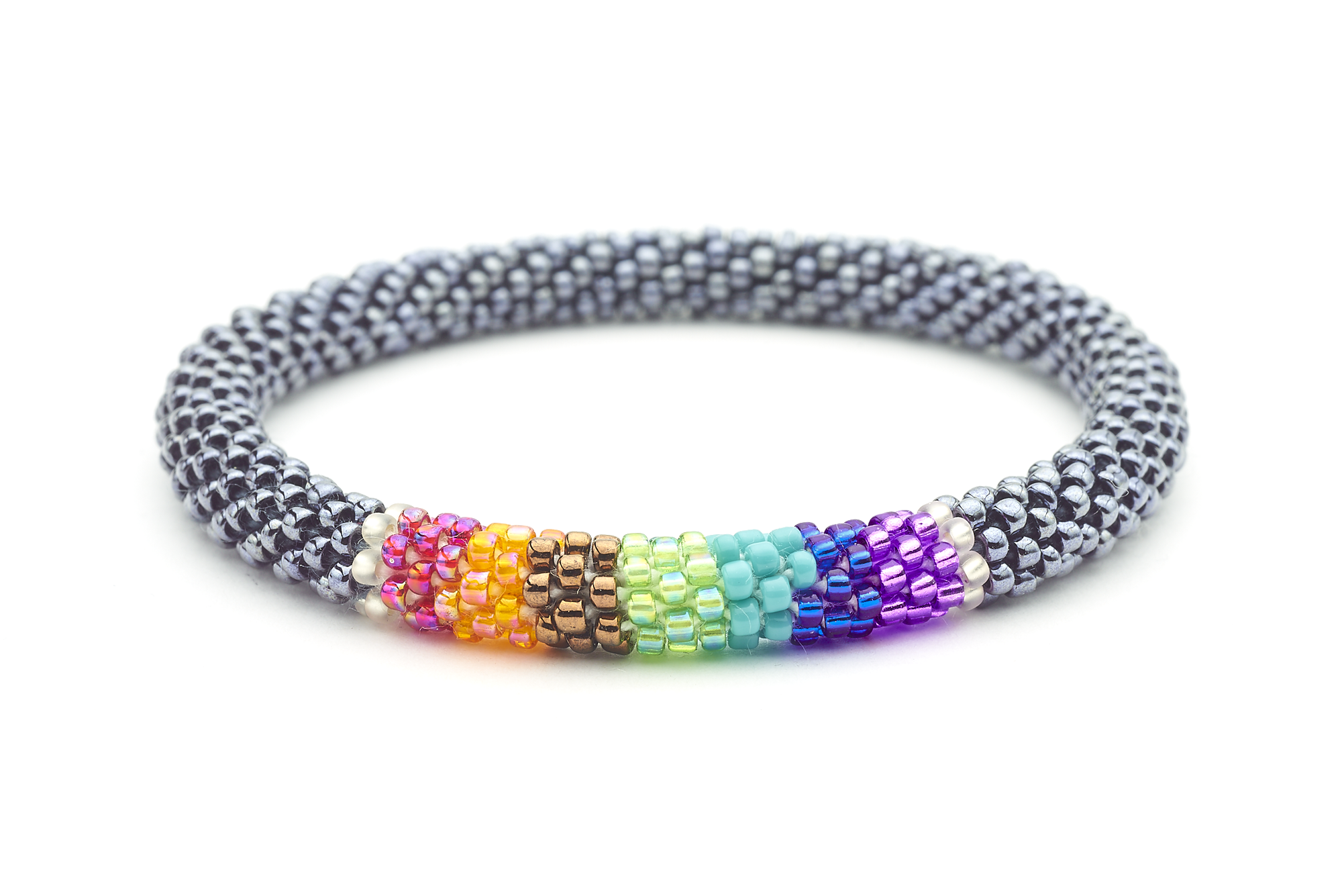 Sashka Co handmade beaded friendship bracelet with silver and chakra-colored line pattern. Crafted in Nepal by skilled artisans.