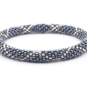 Sashka Co handmade beaded friendship bracelet with silver and clear glass beads. Crafted in Nepal by skilled artisans in a criss cross pattern.